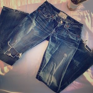 Size 29L very distressed Big Star denim jeans.